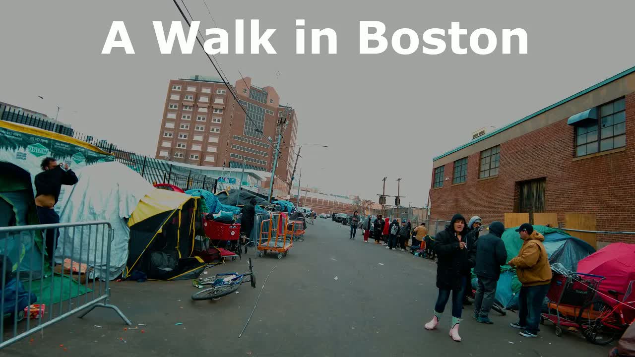Atkinson Street, Boston at daytime in overcast light: tents and carts lining both sides of the street.
